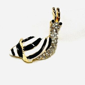 Brooch, Snail adorned with/ white & black enamel paint and rhinestones, NIP